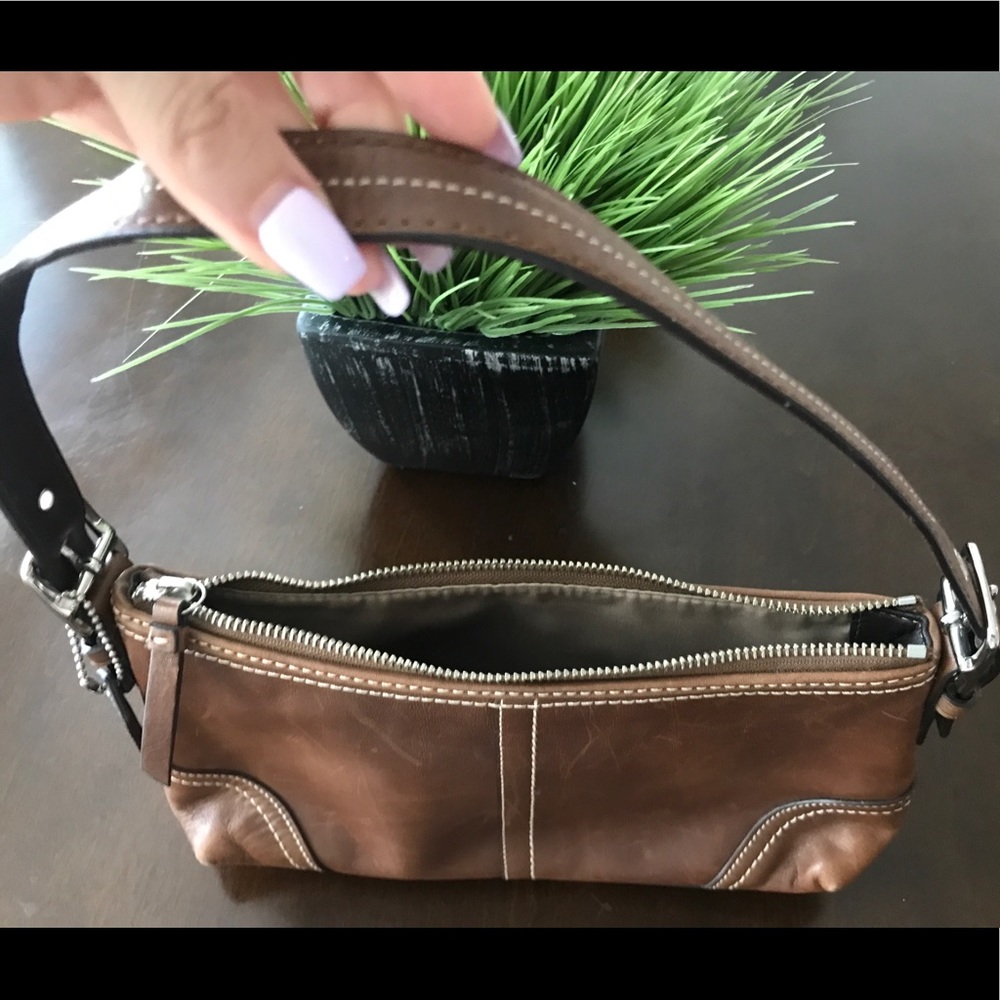 Coach brown bag with zipper top & adjustable strap